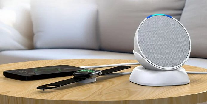 PlusAcc Stand for Echo Pop in white featuring USB-C and USB-A charging ports on a bedside table